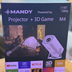 Box of Mandy portable Smart Projector + 3D Game M4 with images and text on a blurred background