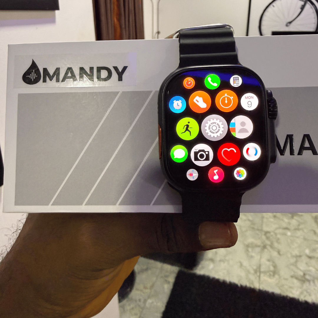Mandy Android Smartwatch M12 with colorful app icons held in front of a MANDY branded box.